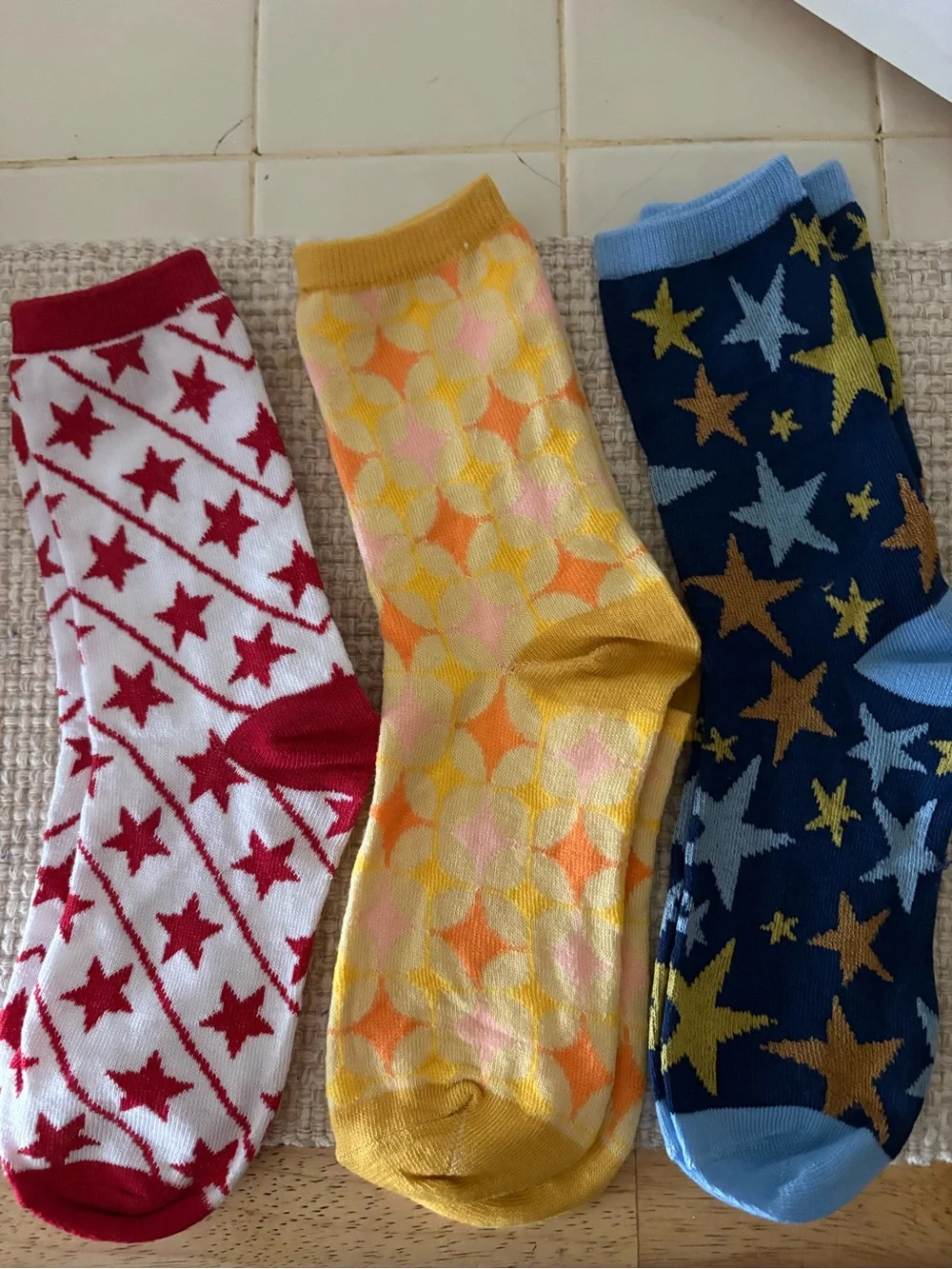 6 pairs of multi colored women’s socks.